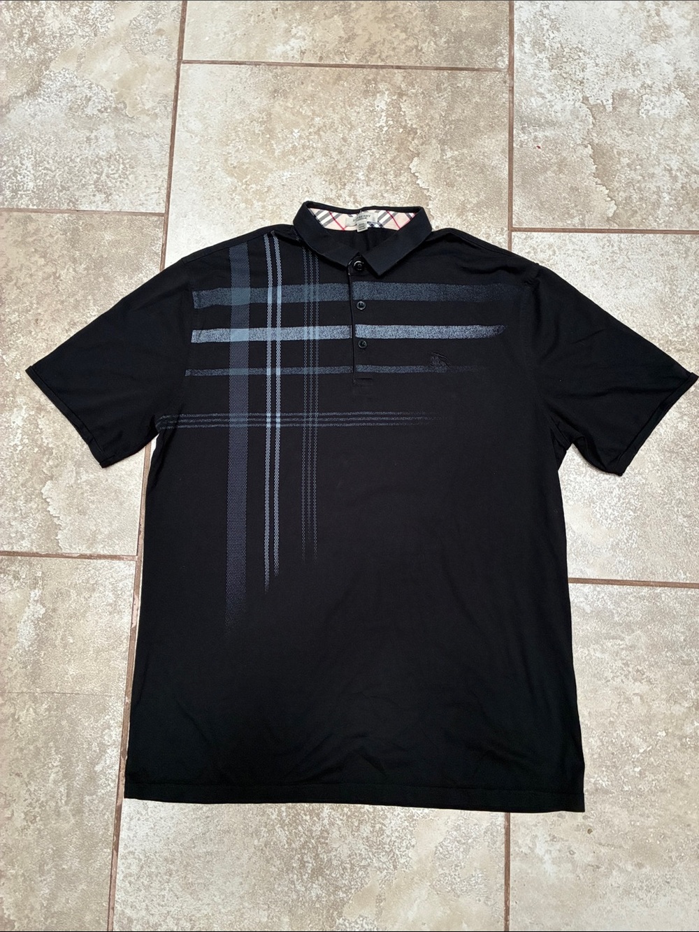 Burberry Black Polo with Subtle Blue Plaid Graphic